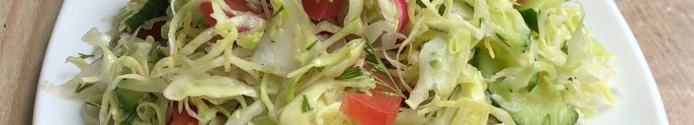 Салат з молодої свіжої капусти та огірків. Рецепт ароматної заправки.